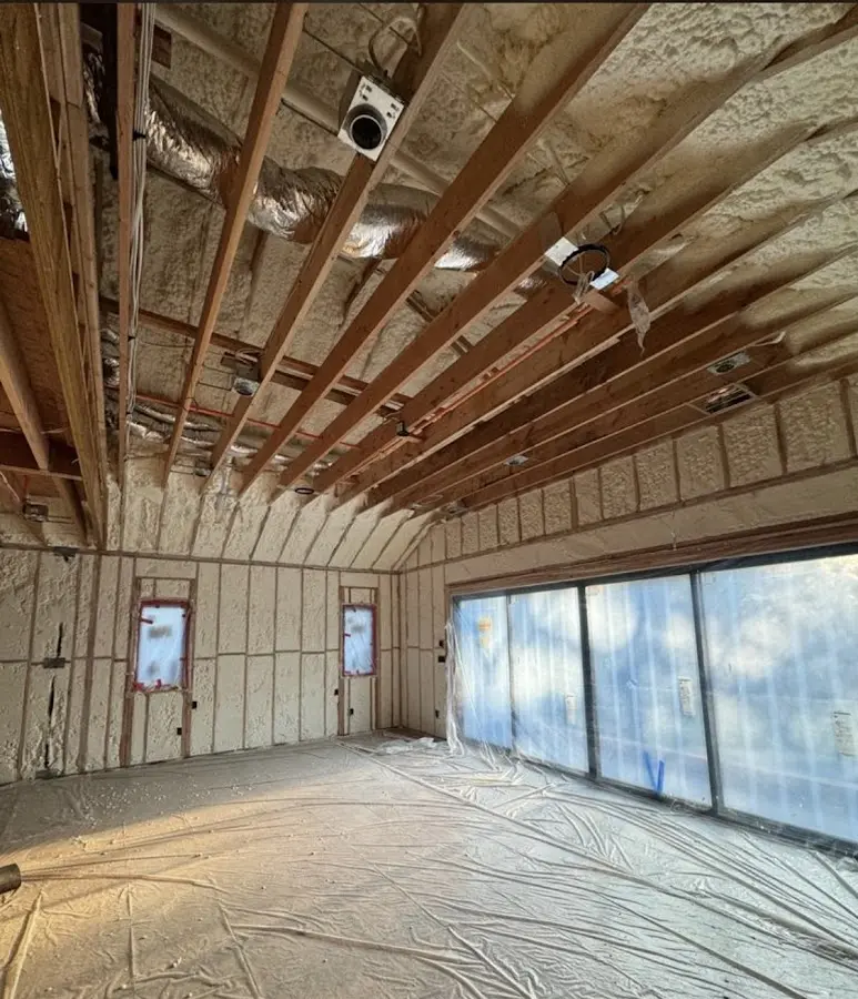 Interior walls and ceiling insulated with spray foam during new construction in Post Falls